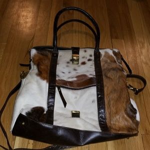 Never worn Pulicati genuine leather